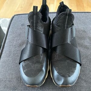 Sorel black Velcro strap tennis shoes. Size 7.5